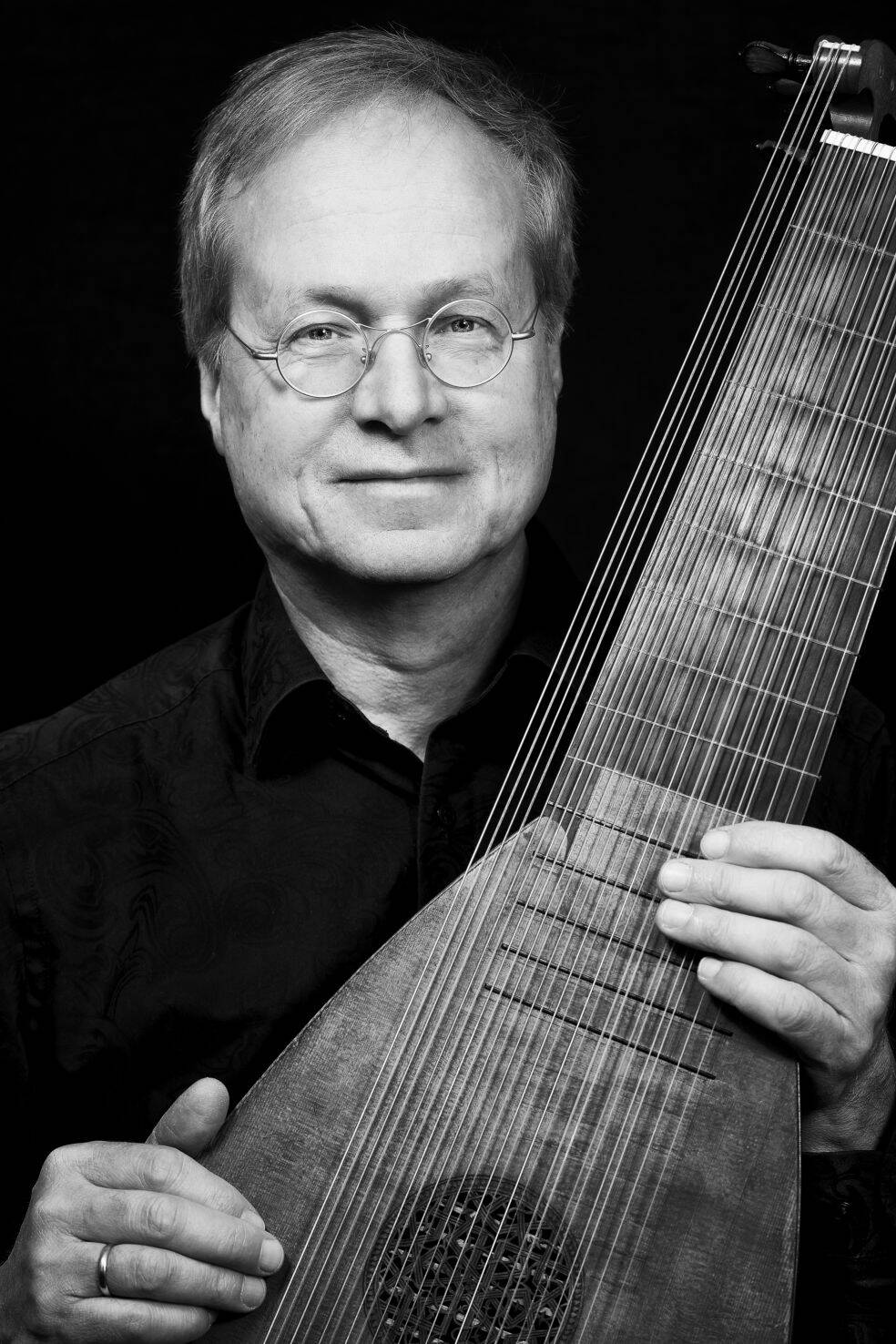 Michael Freimuth plays a long-necked lute known as the theorbo. (Photo by Sven Zimmermann)