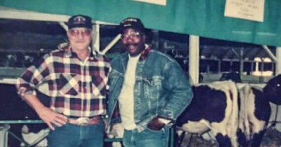 Eastern Washington cattle breeder Duane Mickelsen (left) and actor Carl Weathers (right) showing cattle at the Yakima County Fairgrounds. (Photo courtesty of Duane Mickelsen)
