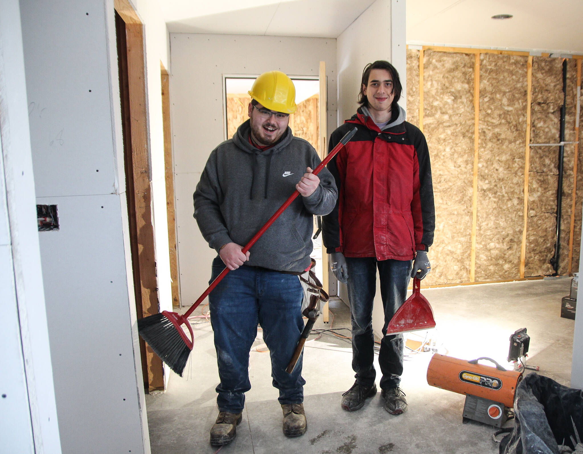 Photo by Luisa Loi
As interns from Exceptional Academy, Jonathan Shields (left) and Jonathan Brady (right) are learning construction skills that might help them secure a job in construction in the future.