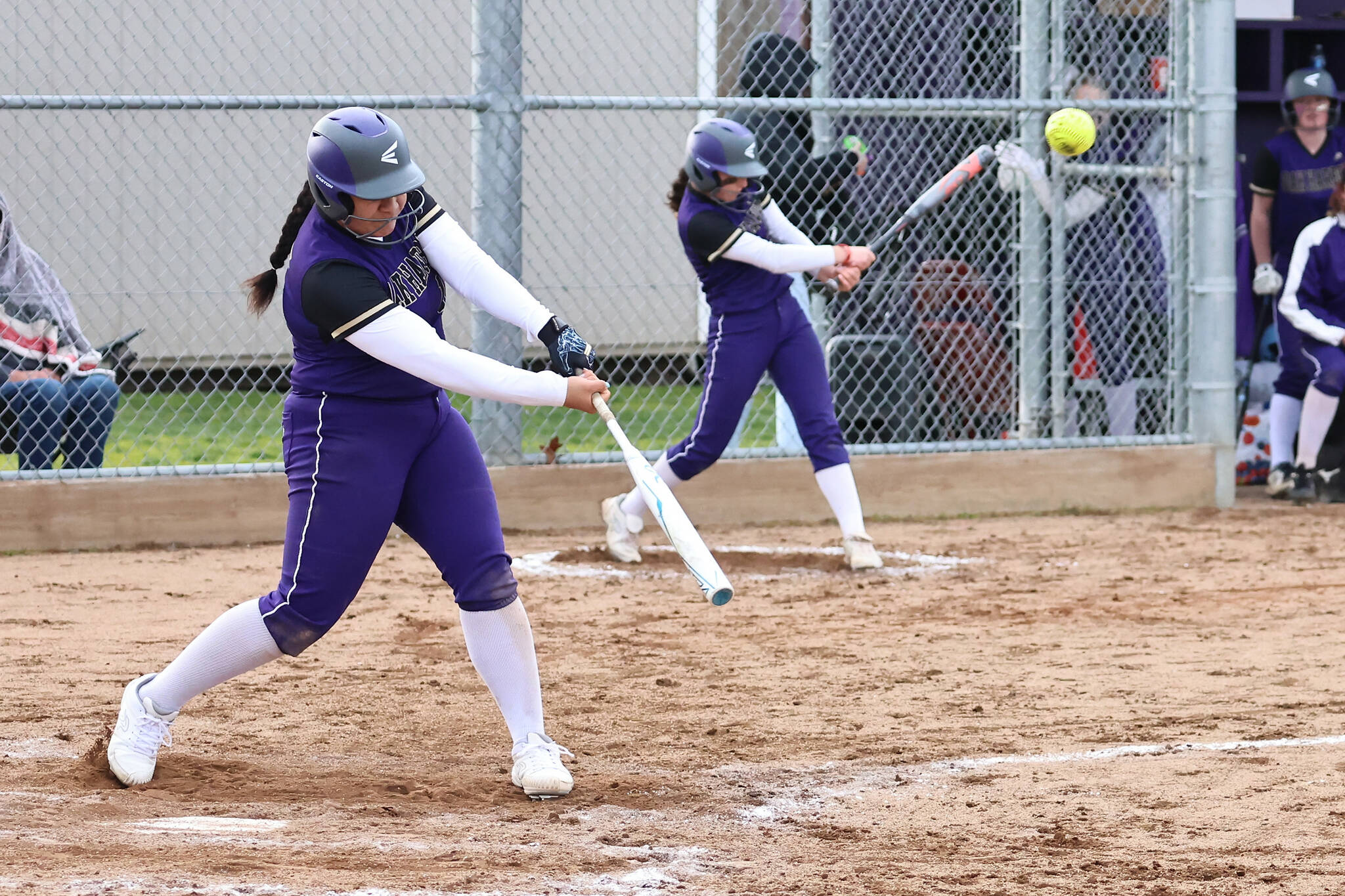Photo by John Fisken
Oak Harbors Loto Tupu hits a ball during a loss against Cascade March 12. She also hit a three-run homerun March 14 during a 6-0 victory against Archbishop Murphy.