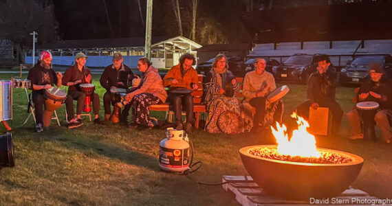 Around 50 people from a few months old to seniors encircled a propane firepit by a beautiful historic barn of the Whidbey Island Fairgrounds. (Photo courtesy of David Stern)
