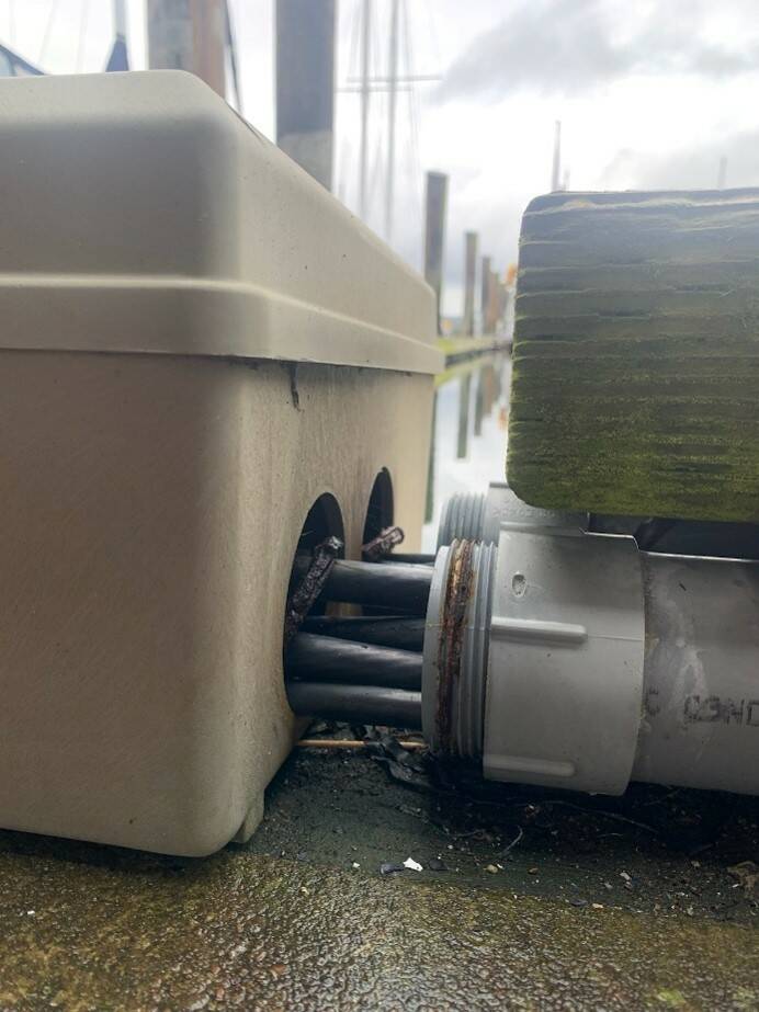 Saturday, March 16, an electrician found a serious electrical system failure causing a power line to arc, cutting power to the E, F and G docks of the Oak Harbor Marina. (Photo provided)