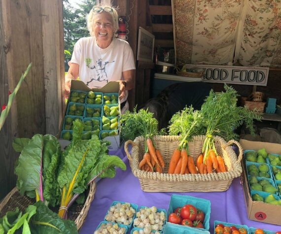<p>Photo by Kirstin Clauson</p>
                                <p>Anza Muenchow of Maha Farm sold her vegetables at last year’s South Whidbey Tilth Farmers Market.</p>