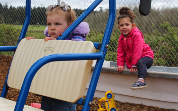 Photo by Luisa Loi
Olivia Pursell and Talia Skaugrug play at Ebey Academy’s playground.