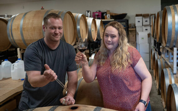 Michelle Graham samples a glass of wine. She and her husband, Kyle O’Neill, are the owners of Leo & Leto’s, formerly known as Blooms Winery. (Photo by David Welton)