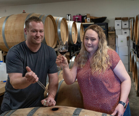 Michelle Graham samples a glass of wine. She and her husband, Kyle O’Neill, are the owners of Leo & Leto’s, formerly known as Blooms Winery. (Photo by David Welton)
