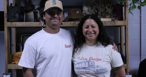 Levi and Shannon Woods pose inside their new business venture (Photo by Allyson Ballard)