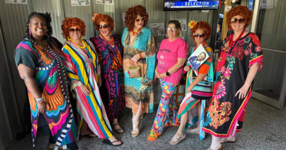 Women dressed up for a local Roper Romp.