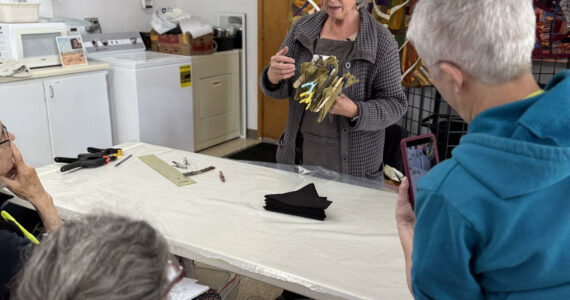 Teacher Elin Noble demonstrates a technique (Photo by Matt Neinhuis)