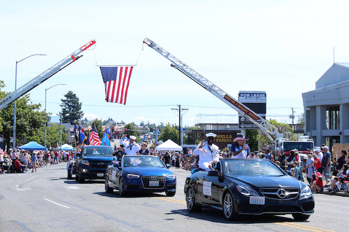 A car featuring the Sea Sailor of the Year cruises down the street (Photo by Allyson Ballard)