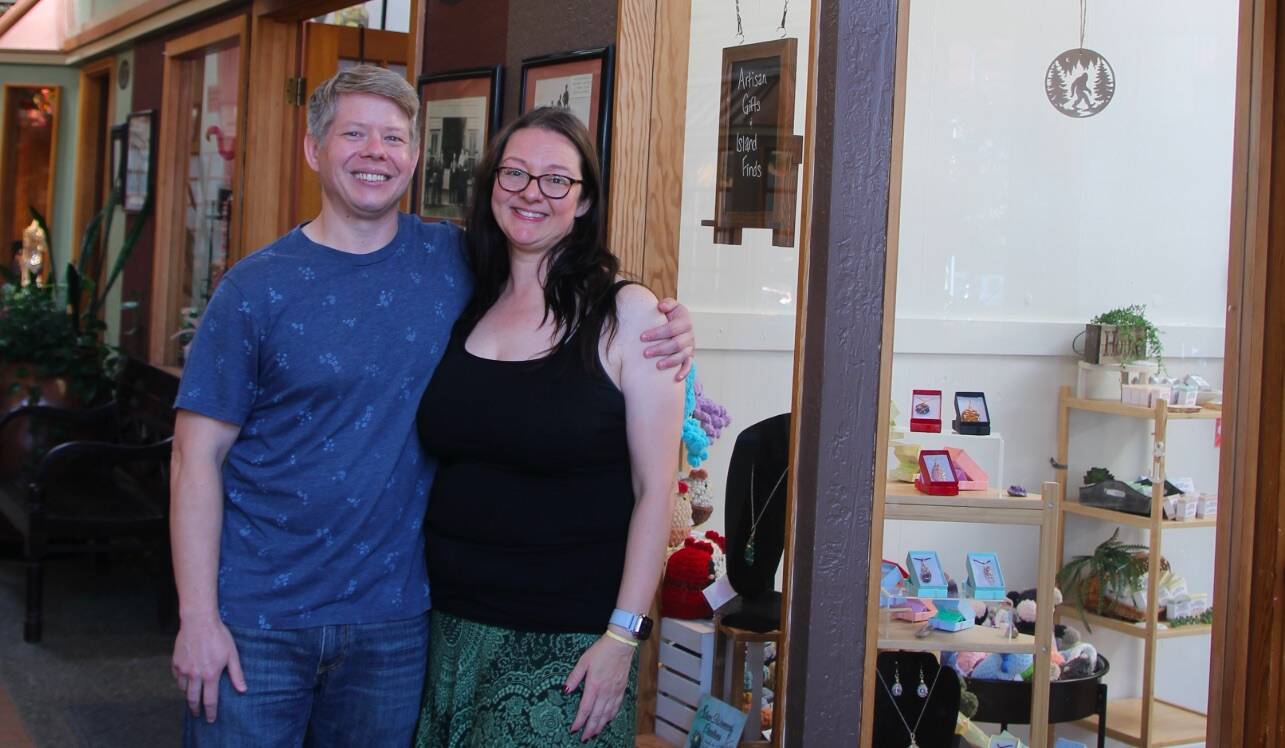 (Photo by Marina Blatt) Co-owners Kate Kilpatrick and Paul Rose smile outside of their storefront.