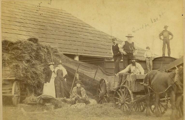 Photo courtesy of ICHS 2023.045.001.
Pictured here is a threshing scene from 1890 at the Izett Farm, which once stood on the land where Naval Air Station Whidbey is currently located.