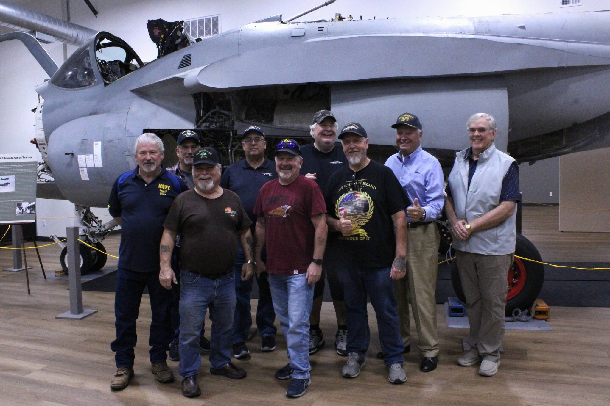 (Photo by Allyson Ballard) Original crew members of the USS Whidbey Island toured the Pacific Northwest Naval Air Museum as part of a reunion last week.