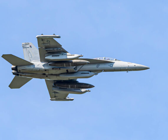 Photo by Joe Kunzler
An EA-18G Growler with jamming pods flies over Whidbey Island.