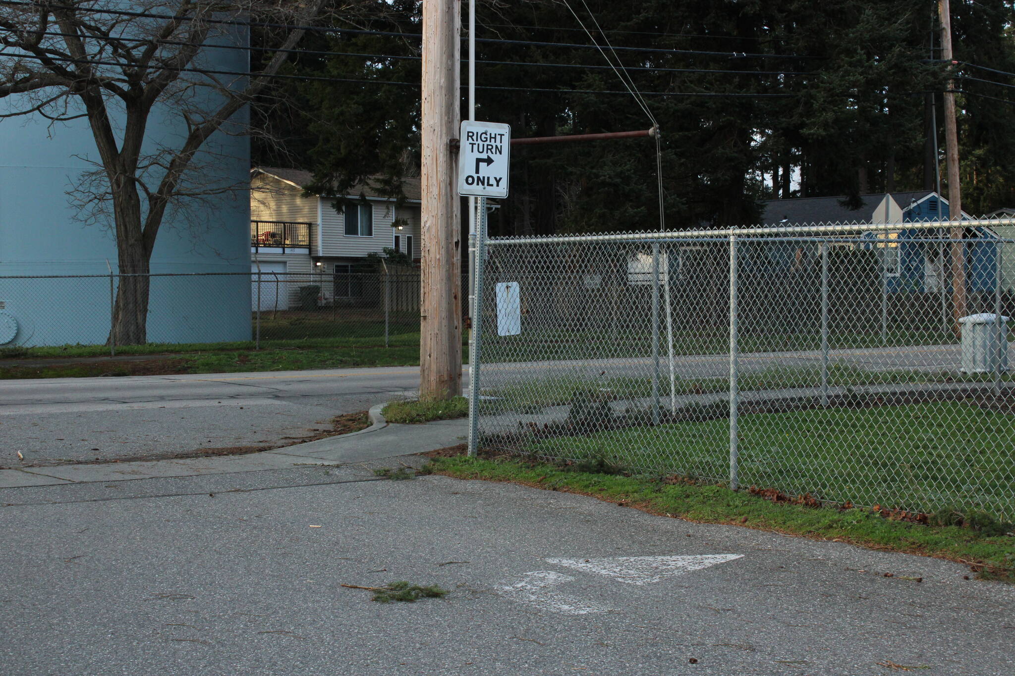 Photo by Allyson Ballard
There is no stop sign, a rather faded pavement marking and a sign reading right turns only at the second exit, which feeds traffic into the intersection of Regatta and 5th.