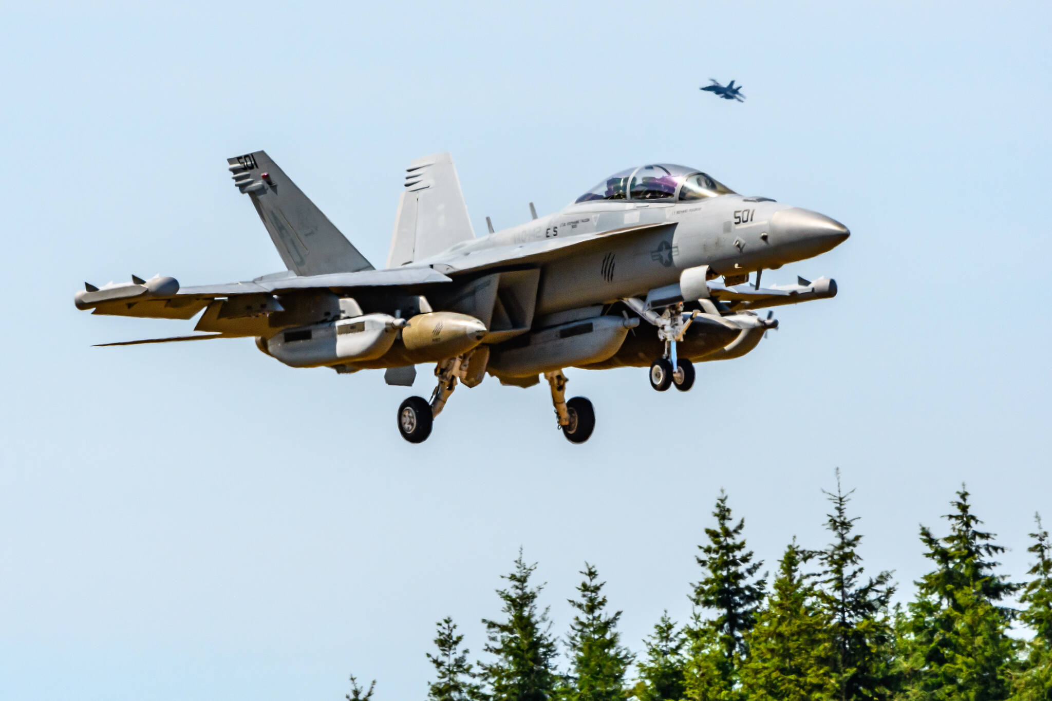 Photo by Joe A. Kunzler
A Growler from VAQ-142 practices at the Outlying Field in Coupeville in June.