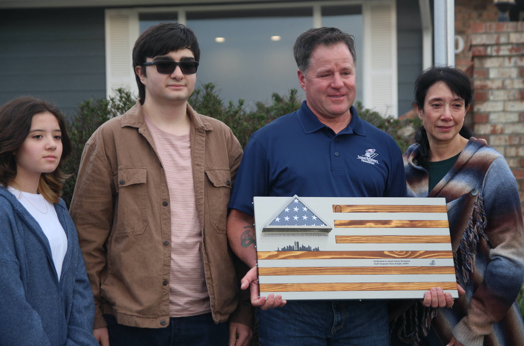 (Photo by Marina Blatt) Terry Knight, a veteran diagnosed with a neurodegenerative disease, Amyotrophic Lateral Sclerosis, celebrated moving into a smart home in Coupeville with his wife and two kids on Dec. 20.