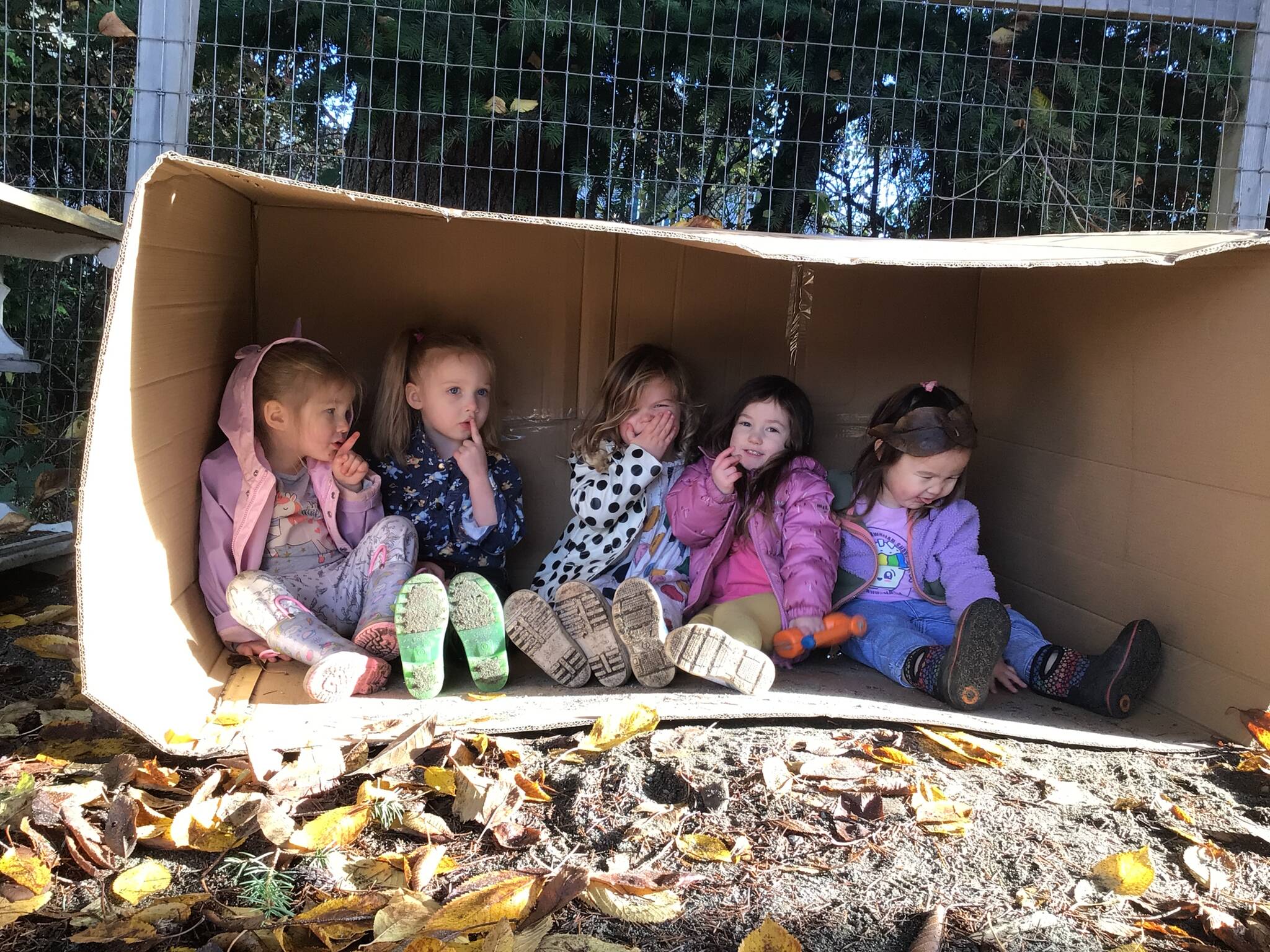 (Photo provided by Caitlin Voss) Kids in the 2025 Honey Bear class at the South Whidbey Childrens Center have some autumn fun outdoors.