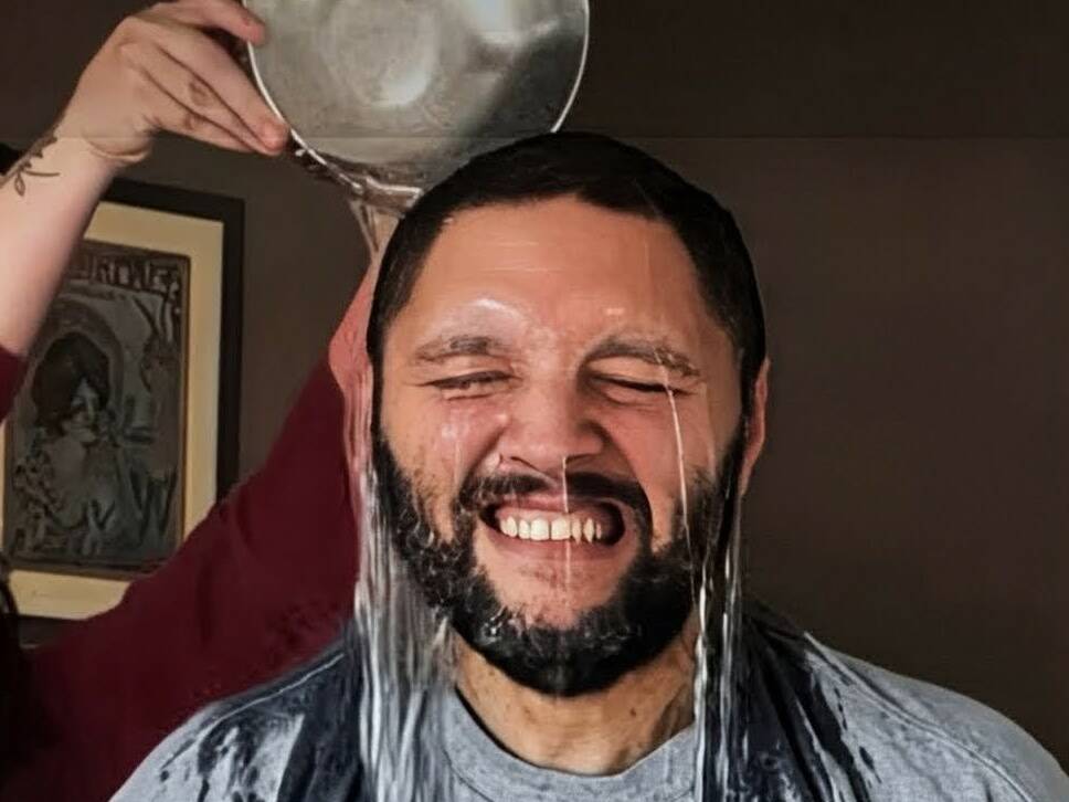 Photo provided. Brandon Doucette does the #vets2x Ice Bucket Challenge like a champ, sporting a big smile as freezing water drips down his face.