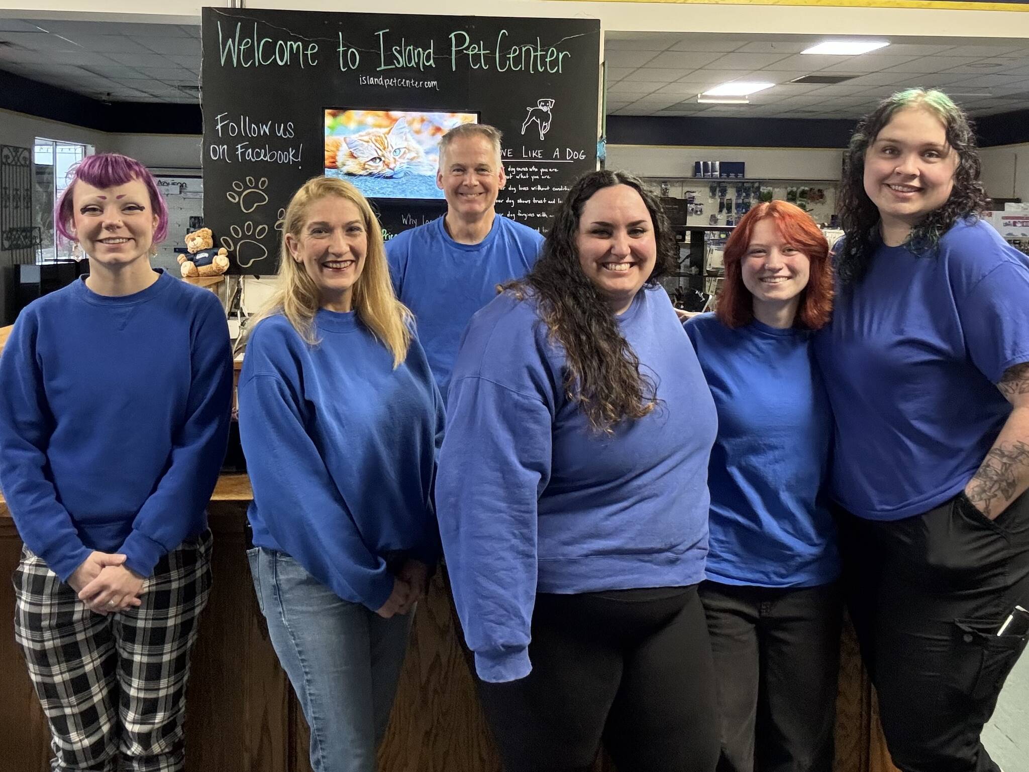 Photo provided. Island Pet Center staff, pictured here, held a retirement sale at the store on Monday.