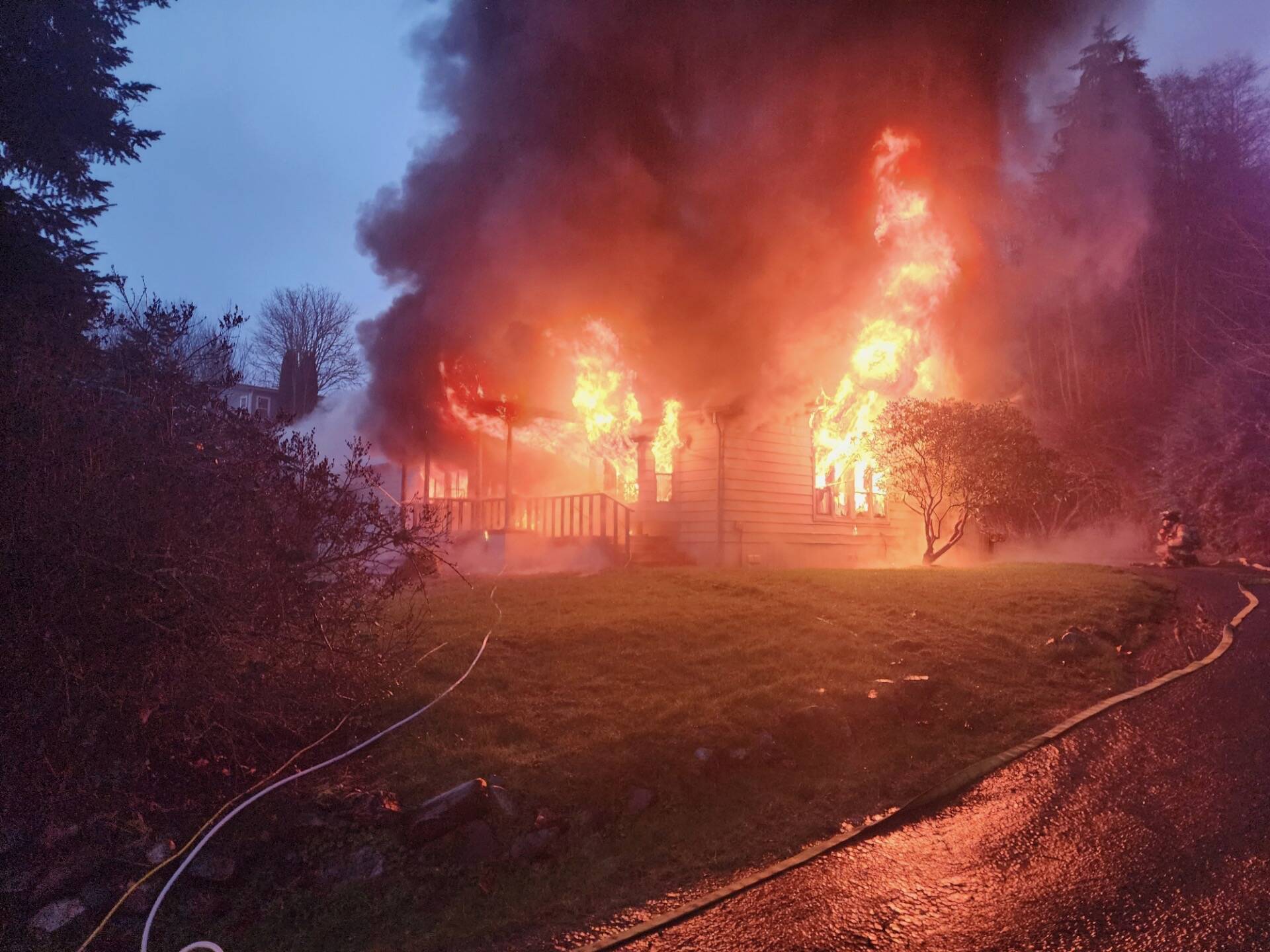 (Photo provided by South Whidbey Fire/EMS) A fire that destroyed a mobile home Friday night in Freeland is still under investigation.