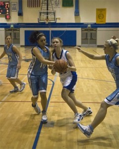 Falcon Cayla Calderwood takes to the air against Sultan point guard Marissa Donnelly Tuesday during South Whidbeys 63-39 loss.