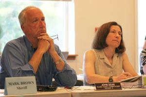 County Commissioners John Dean and Angie Homola listen to residents speak about Proposition 1 during a forum in Freeland on Wednesday.