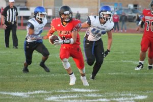 Coupeville receiver Hunter Smith scored the Wolves’ third touchdown against South Whidbey on a 19-yard catch-and-run. Smith scored three touchdowns on the night and used his speed to outrun the Falcons’ young and inexperienced defense. South Whidbey lost 41-10 on Saturday night.