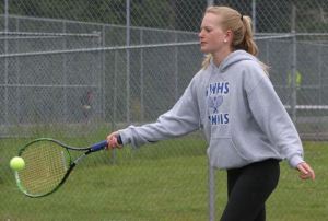 Carlie Newman lines up a forehand in the first round of the 1A District 1 girls tennis tournament May 9 at South Whidbey High School. She defeated Coupeville senior Amanda d'Almeida on May 10 in Mount Vernon for the second seed in the tri-district tournament.