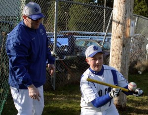 Tom Fallon instructs his son