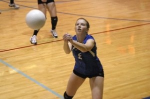 Allissa Couple stretches to recover an errant ball during South Whidbey’s win over Coupeville.