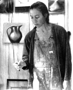 Susan O’Brien works on a painting at her home studio. The artist recently suffered a ruptured brain aneurysm.