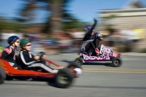 2007 Soup Box Derby racers head toward the finish line on First Street in Langley.