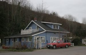 Developers want to build a new four-story residential/commercial project near the Langley Marina on the Drake's Landing property. The existing home