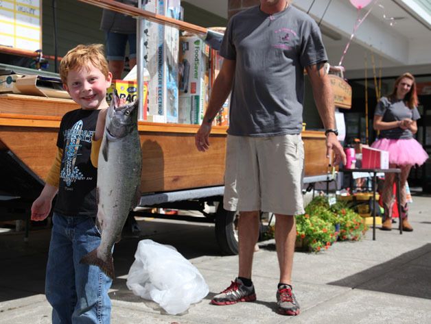 A proud Cowan Criswell of Freeland holds up his catch