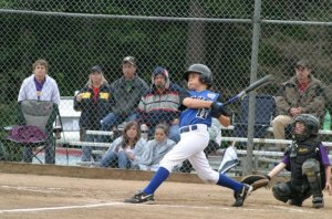 Pitcher Charlie Patterson puts everything he has into a double to left field that helped the South Whidbey All Stars beat North Whidbey on Wednesday. The series ended the next day in a 9-8 loss to Burlington-Edison.