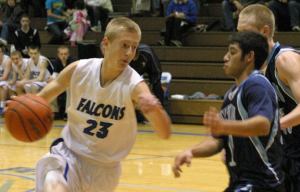 Riley Newman drives against a Sultan double team. Newman scored a career-high 46 points against the Turks to help end a two-game losing streak.