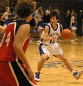 Falcon Jeff Brasko prepares to invade Coupeville’s space Saturday. South Whidbey won 58-50 after losing to the same team earlier in the week.