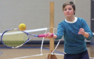 Tess Radisch whips a forehand during a recent indoor practice.