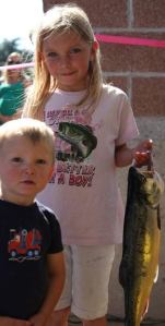 Taylor Fifield holds her first-place pink salmon from the 2011 Freeland Ace pink salmon derby.