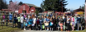 Above: Kids ready to hunt gather Saturday at the Whidbey Island Fairgrounds for its first annual Easter egg hunt. Hundreds of children chased after the candy-filled eggs as their parents looked on. Below