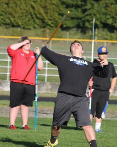 Maverick Christensen heaves the javelin during a recent training day at South Whidbey High School.