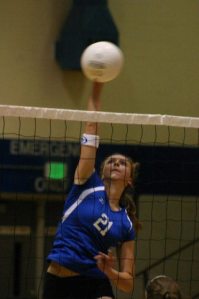 Middle hitter Katie Holt elevates to send the volleyball back to Sultan in Thursday’s league victory.