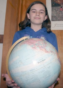 Carli Newman has the world in her hands after winning the National Geographic Geography Bee at Langley Middle School. The sixth-grade student is the first in at least seven years to win the school title
