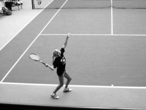 Hayley Newman serves during the state 2A girls tennis tournament. The Falcon junior was eliminated in the third round.