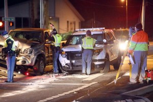 Law enforcement officers inspect the Highway 20 crash Dec. 9.