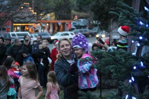 Denise Need dances with daughter Piper during a Christmas song at the Langley Tree Lighting on Saturday