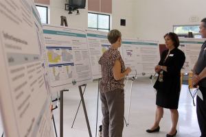 Kelly McDonald (left) discusses the Urban Growth Area rezoning with County Commissioner Helen Price-Johnson.