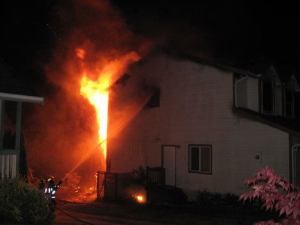 A house burns at Useless Bay early Sunday  morning. No one was home at the time of the fire