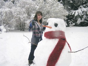 Maddie Barker of Freeland stands next to George